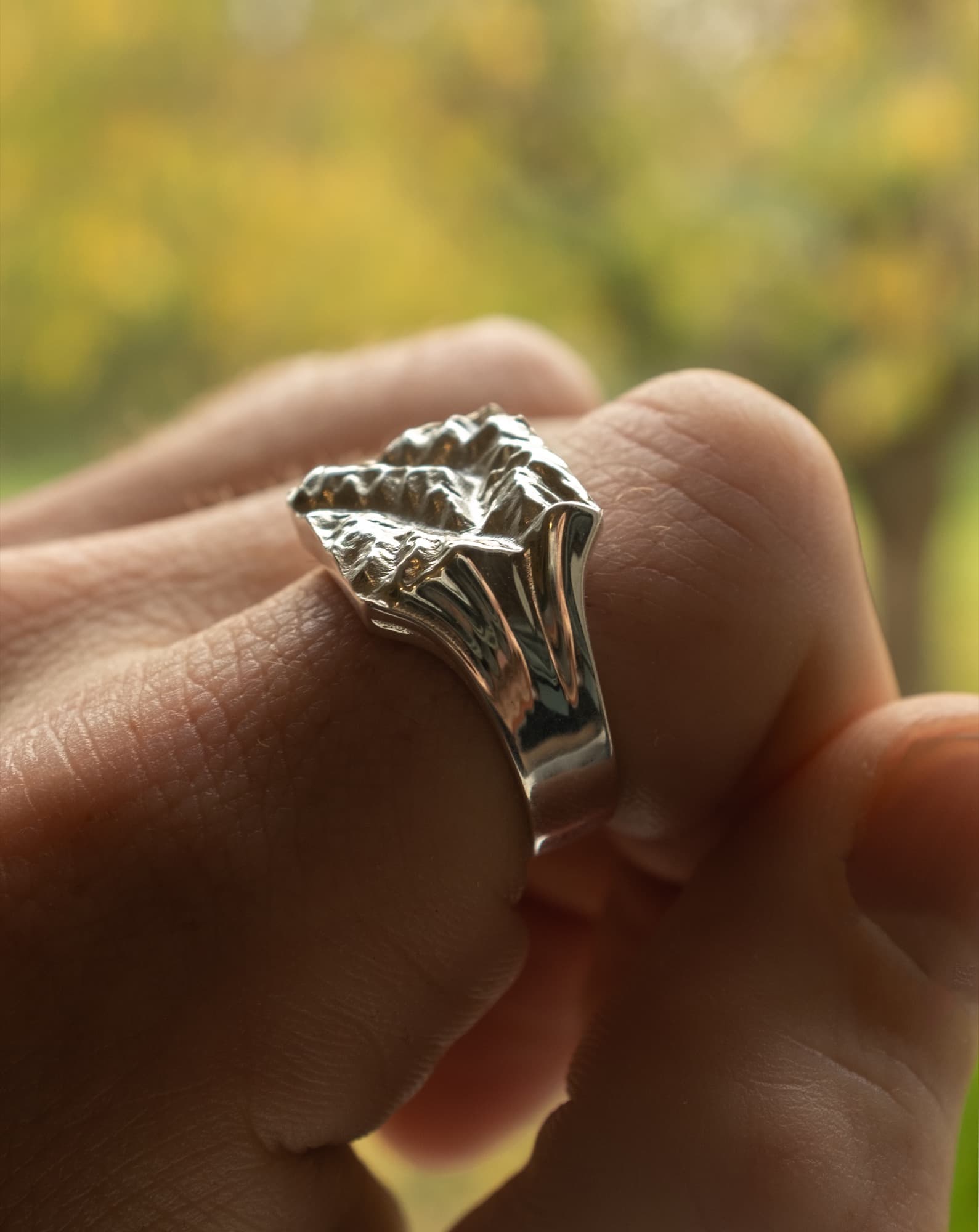 Custom map ring commission showing personalised terrain lines